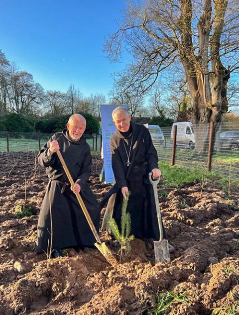 Benedictine Fr. Anthony Keane and Abbot Brendan Coffey plant saplings at Glenstal Abbey in County Limerick, Ireland. (Courtesy of 100 Million Trees Project)