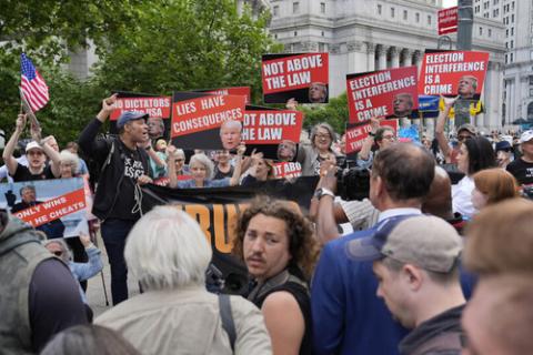 Trump felony conviction People hold signs outside of courthouse