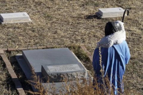 Grave of Father Gerald Fitzgerald, Via Coeli Monastery, N.M. Grave with small statue.