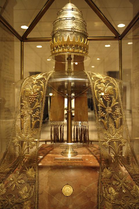 A gold metallic embroidered stole of Pope John XXIII and the papal tiara of Pope Paul VI are displayed at the Basilica of the National Shrine of the Immaculate Conception in Washington on Oct. 30, 2009. (CNS/Bob Roller)