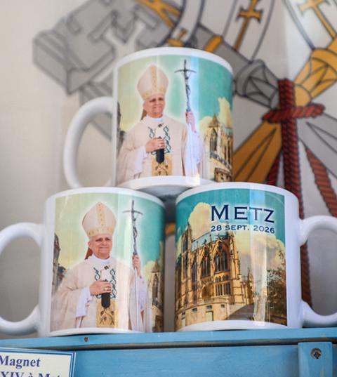 Mugs with pictures of Pope Leo XIV and Saint-Étienne Cathedral are displayed at a souvenir shop in Metz, France. (OSV News/Reuters/Ardee Napolitano)