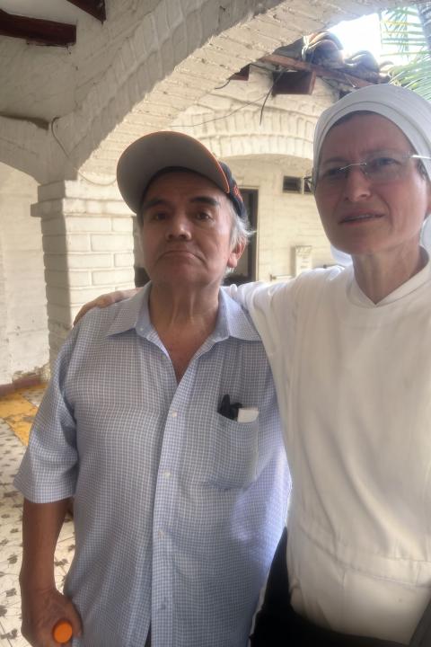 Sr. Paula Andrea Naranjo accompanies one of the residents of the Little Sisters of the Poor's nursing home in Cali, which was affected by the Aug. 10, 2026, earthquake in Colombia. (Courtesy of Paula Andrea Naranjo)