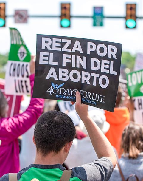 A participant in the Virginia March for Life in Richmond April 27, 2022, carries a sign in Spanish reading, "Pray for an end to abortion." (OSV News/The Catholic Virginian/Michael Mickle)