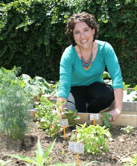 Bethany Welch, founding director of the Aquinas Center in South Philadelphia, in the center's garden (CNS/CatholicPhilly.com/Sarah Webb) Bethany Welch, founding director of the Aquinas Center in South Philadelphia, in the center's garden (CNS/CatholicPhilly.com/Sarah Webb)