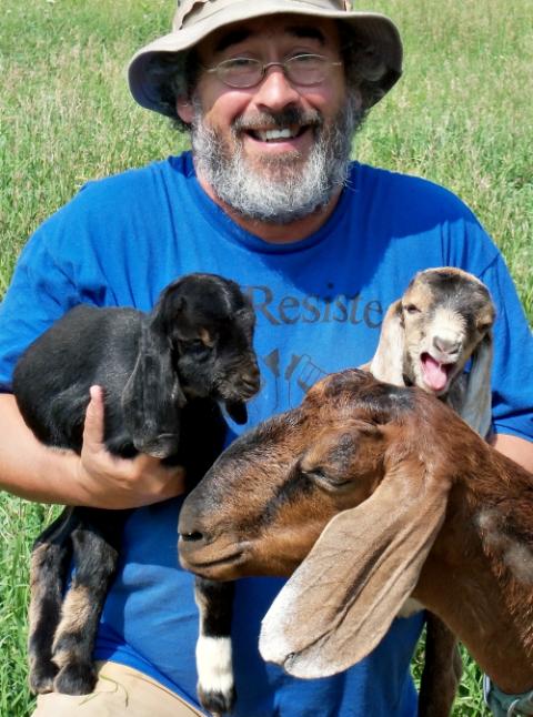 Brian Terrell and goats at Strangers and Guests Catholic Worker Farm in Maloy, Iowa (Betsy Keenan) Brian Terrell and goats at Strangers and Guests Catholic Worker Farm in Maloy, Iowa (Betsy Keenan)
