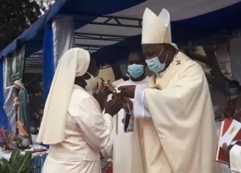 Franciscan Sr. Emiliana Bundo at a celebration of her 45th anniversary of consecrated life last year, with Archbishop Filomeno do Nascimento Vieira Dias of Luanda, Angola (Courtesy of Radio Ecclesia)