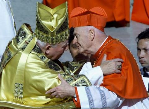 Then-Cardinal Theodore McCarrick embraces Pope John Paul II after receiving his biretta, the four-cornered red cardinal's hat, during a consistory ceremony in St. Peter's Square in Vatican City Feb. 21, 2001. (CNS/Reuters/Vincenzo Pinto)