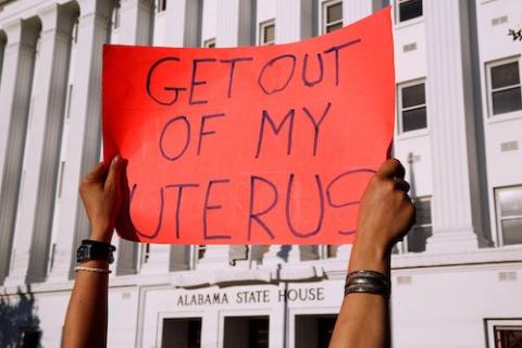 A demonstrator in front of the Alabama State House protests May 14, 2019, against an Alabama law banning nearly all abortions. (CNS/Reuters/Chris Aluka Berry)