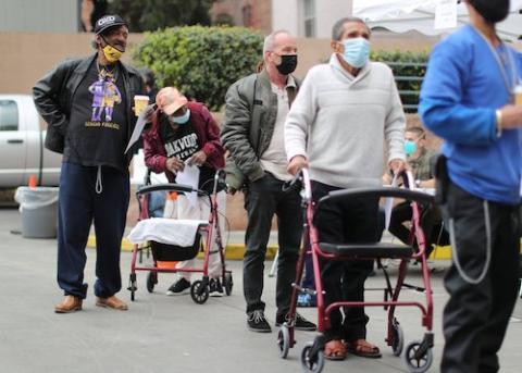 Elderly people in Los Angeles line up to receive the coronavirus vaccine Feb. 10, 2021. (CNS/Reuters/Lucy Nicholson)