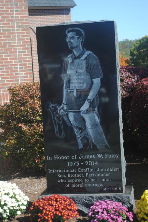 The memorial for journalist James Foley outside Saint Katharine Drexel Catholic Church in Alton, New Hampshire. (Photo courtesy of St. Katherine Drexel Catholic Church)