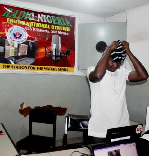 Ekene Odigwe gets ready to record his weekly show in a Radio Nigeria studio. (Patrick Egwu) Ekene Odigwe gets ready to record his weekly show in a Radio Nigeria studio. (Patrick Egwu)