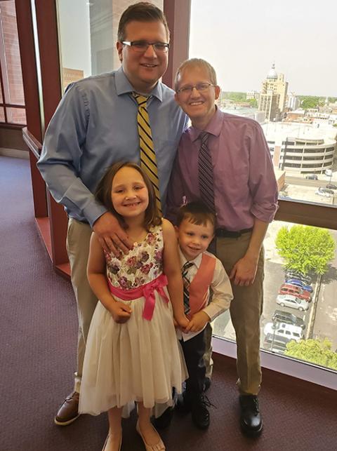 John Freml, left, with husband Rick Nelson and their children Jordan Freml-Nelson, front left, and Riley Freml-Nelson. (Courtesy of John Freml) John Freml, left, with husband Rick Nelson and their children Jordan Freml-Nelson, front left, and Riley Freml-Nelson. (Courtesy of John Freml)