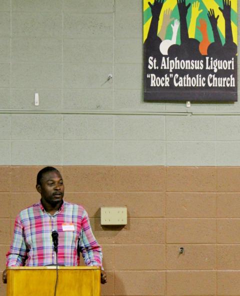 Community activist Justin Idleburg speaks during a racial justice event at St. Alphonsus Liguori Catholic Church in St. Louis Aug. 1. (NCR photo/Brian Roewe)