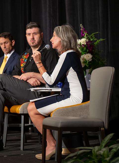An empty chair was added to the stage during the Catholic Partnership Summit in Washington. Also pictured: Krisanne Vaillancourt Murphy, right; Vicente Del Real, center; and John Cannon, left. (Maximilian Franz Photography) An empty chair was added to the stage during the Catholic Partnership Summit in Washington. Also pictured: Krisanne Vaillancourt Murphy, right; Vicente Del Real, center; and John Cannon, left. (Maximilian Franz Photography)