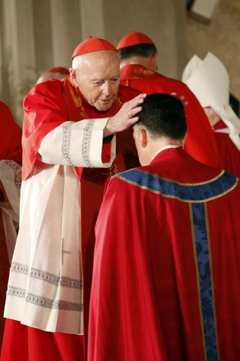 Then-Cardinal Theodore McCarrick lays hands on Bishop James Checchio during his episcopal ordination and installation as bishop of Metuchen, New Jersey, in 2016. (CNS/Gregory A. Shemitz)