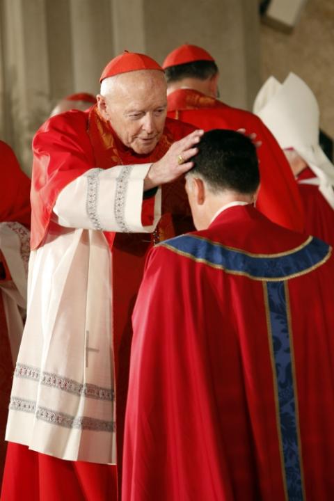 Then-Cardinal Theodore McCarrick lays hands on Bishop James Checchio during his episcopal ordination and installation as bishop of Metuchen, New Jersey, in 2016. (CNS/Gregory A. Shemitz) Then-Cardinal Theodore McCarrick lays hands on Bishop James Checchio during his episcopal ordination and installation as bishop of Metuchen, New Jersey, in 2016. (CNS/Gregory A. Shemitz)