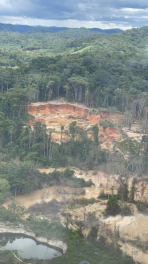 Large pits left behind by illegal miners operating in Yanomami territory (Courtesy of Junior Hekurari)