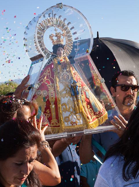 Photo from Noé Montes Photo from Noé Montes, an artist who comes from a family of migrant farmworkers, taken in Mecca, California, during an annual visit of La Virgen de Zapopan to the United States in 2015. (Courtesy of Noé Montes)