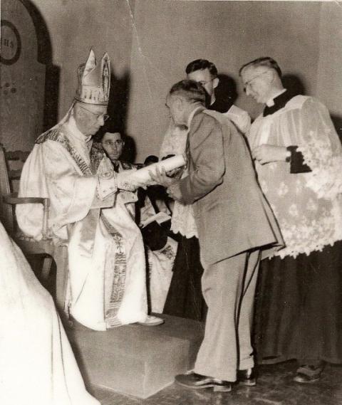 Auguste Robert "Nonco" Pelafigue receives papal honors from Bishop Jules B. Jeanmard of Lafayette, Louisiana, in this undated photo. (CNS photo/courtesy Diocese of Lafayette)