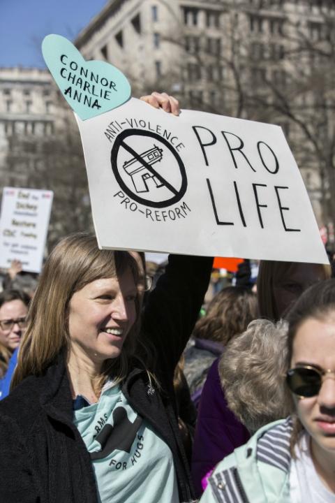 A woman holds a sign during the March for Our Lives event in Washington March 24, 2018. (CNS/Catholic Standard/Jaclyn Lippelmann)