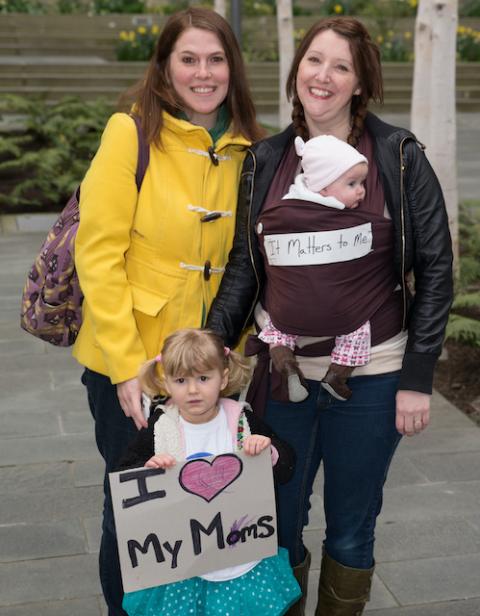 Two women with their children participate in a marriage equality march in Seattle in 2013. Catholic Social Services sued the city of Philadelphia over its LGBTQ anti-discrimination law, which CSS said violates its constitutional right to free exercise of 
