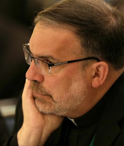 Bishop John Stowe of Lexington, Kentucky, listens to a speaker during the U.S. bishops' assembly in Baltimore Nov. 12. (CNS/Bob Roller)