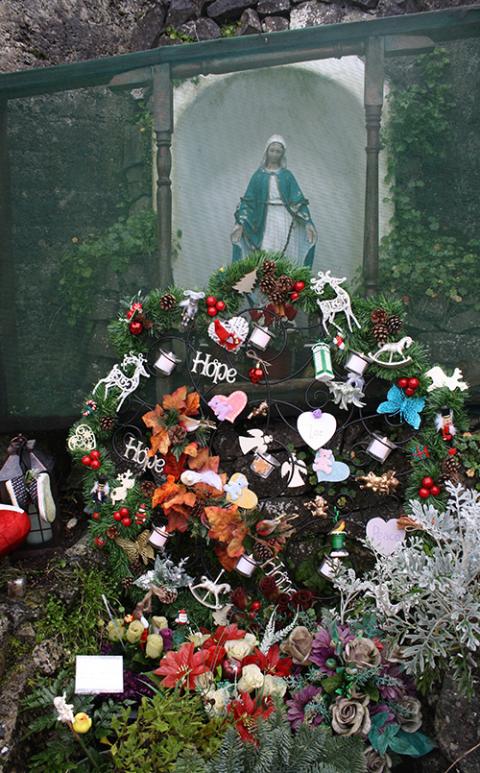 A wreath laid at the site of the former mother and baby home in Tuam, seen in a picture taken December 2021 (Courtesy of Breeda Murphy) A wreath laid at the site of the former mother and baby home in Tuam, seen in a picture taken December 2021 (Courtesy of Breeda Murphy)