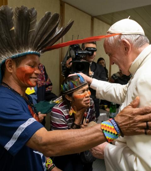 Pope Francis meets indigenous people from the Amazonian region during the Synod of Bishops for the Amazon at the Vatican Oct. 17, 2019. (CNS/Vatican Media) Pope Francis meets indigenous people from the Amazonian region during the Synod of Bishops for the Amazon at the Vatican Oct. 17, 2019. (CNS/Vatican Media)