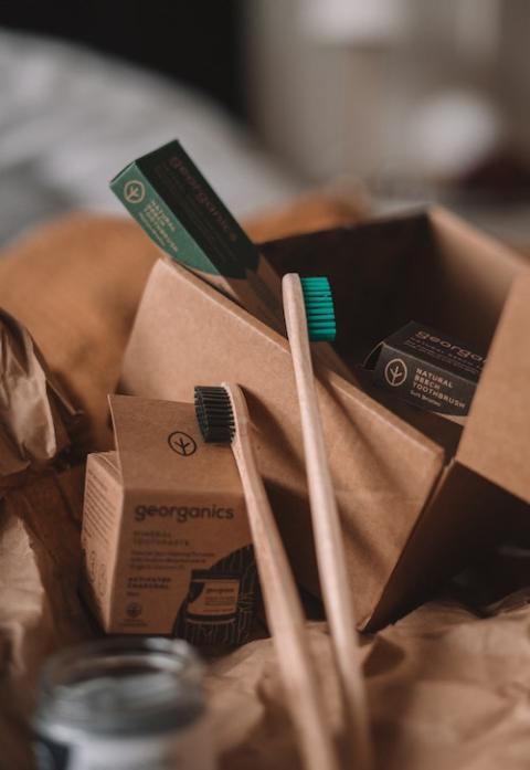 While people say they'd buy "eco-friendly" products, studies show most are reluctant to pay more. (Toa Heftiba/Unsplash)