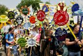 Parishioners from various parishes in New York City hold sunflower signs during the People's Climate March in Washington April 29, 2017. (CNS/Dennis Sadowski)