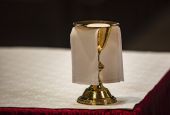 The Eucharist rests upon a paten on an altar in a cathedral. (CNS/Chaz Muth)