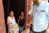 Fr. Raymond Portelli, who has worked in the Peruvian Amazon for nearly three decades, distributes food baskets in Iquitos on Christmas 2020. (CNS/courtesy Fr. Raymond Portelli)