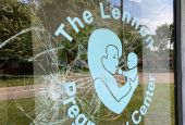 Vandals smashed nearly a dozen windows and spray-painted messages on the side of the building housing the Lennon Pregnancy Center in Dearborn Heights, Michigan on June 20. (CNS screengrab/Facebook, Lennon Pregnancy Center)