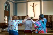 A handful of parishioners in the Gardenville neighborhood of Baltimore attend daily Mass Sept. 16, 2022, at St. Anthony of Padua Catholic Church.