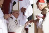 Pope Francis receives his ring from Cardinal Angelo Sodano, dean of the College of Cardinals, during his inaugural Mass in St. Peter's Square at the Vatican March 19, 2013. (CNS/Paul Haring)