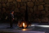 German Vice Chancellor and Economy and Climate Minister Robert Habeck rekindles the Eternal Flame in the Hall of Remembrance at the Yad Vashem World Holocaust Remembrance Center in Jerusalem June 7. (AP/Tsafrir Abayov)