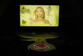 Beyonce appears on screen as she performs the song "Be Alive" from "King Richard" at the Oscars on March 27 at the Dolby Theatre in Los Angeles. (AP/Chris Pizzello)