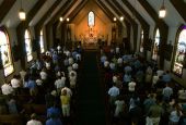 People attend Mass at Christendom College in 2003. (Newscom)