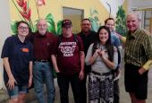 From left: Brinkley Johnson, site coordinator at Annunciation House, and volunteers Harry Hutzel, Richard Champion, Marco Matute, Evelyn Rodriguez, Patrice Kavanaugh and Peter Wise. Not pictured is group coordinator Petrina Grube, who took the photo.