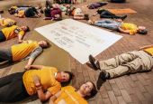 Members of Friends of Fossil Free PCUSA symbolically portray deaths over the next several years in protest of General Assembly 223 voting to not immediately divest from the fossil fuel industry on June 22, 2018, in St. Louis. (RNS/PCUSA/Danny Bolin)