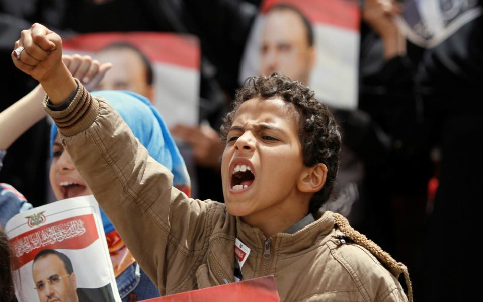 A boy shouts during a protest in Sanaa, Yemen, April 26. Catholic and other faith-based aid groups are urging an end to fighting in Yemen, where three years of war have created a humanitarian crisis. (CNS/Reuters/Mohamed al-Sayaghi)