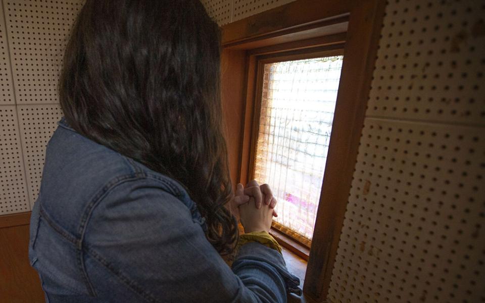 A woman offers her confession to a priest in California in a 2019 file photo. (CNS/Chaz Muth)