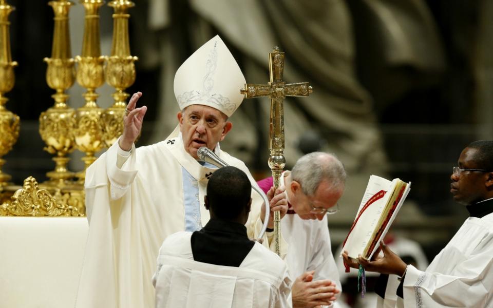 Pope Francis delivers his blessing as he celebrates Mass on the feast of Mary, Mother of God, in St. Peter’s Basilica at the Vatican Jan. 1. (CNS/Paul Haring)
