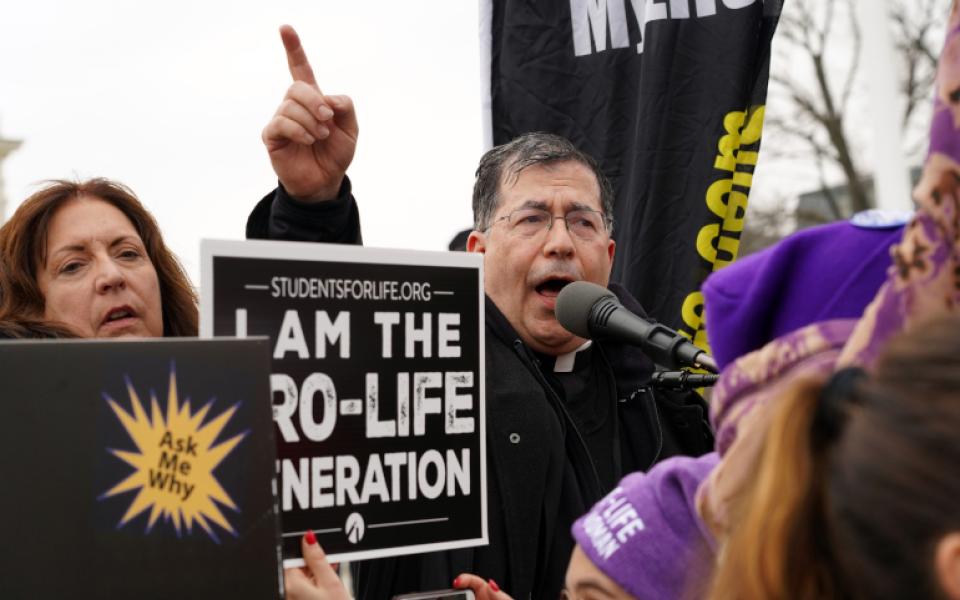 Fr. Frank Pavone, national director of Priests for Life, speaks in front of the U.S. Supreme Court during the 47th annual March for Life in Washington Jan. 24, 2020. (CNS/Long Island Catholic/Gregory A. Shemitz)