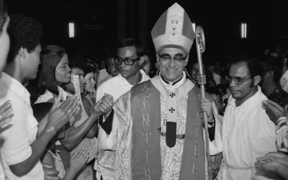 St. Archbishop Óscar Romero greets worshipers in San Salvador, El Salvador, in an undated photo. (CNS/Octavio Duran)