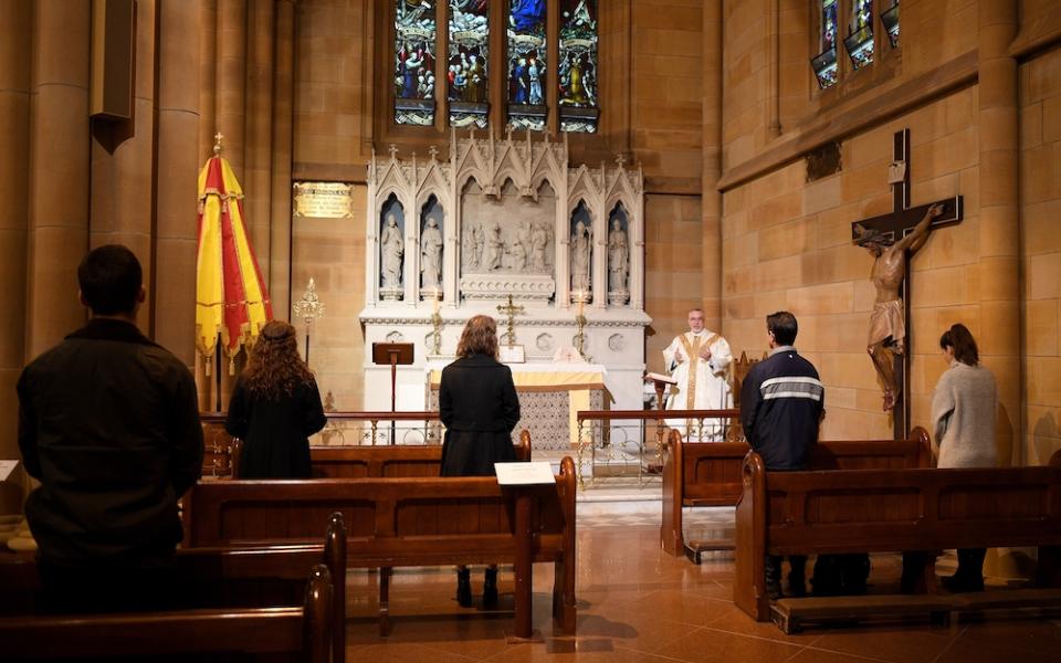 People attend Mass at St Mary's Cathedral in Sydney May 15, 2020, during the COVID-19 pandemic. (CNS/Dan Himbrechts, AAP Image via Reuters) 