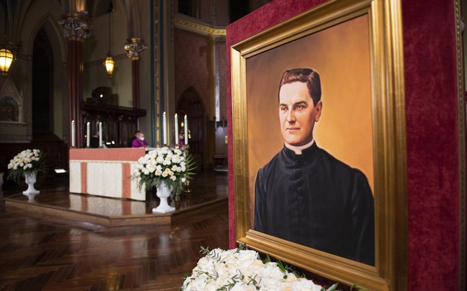A portrait of Blessed Michael McGivney, founder of the Knights of Columbus, is displayed during a prayer vigil at St. Mary's Church in New Haven, Connecticut, Oct. 30, 2020, the eve of his beatification. (CNS/Courtesy of Knights of Columbus)
