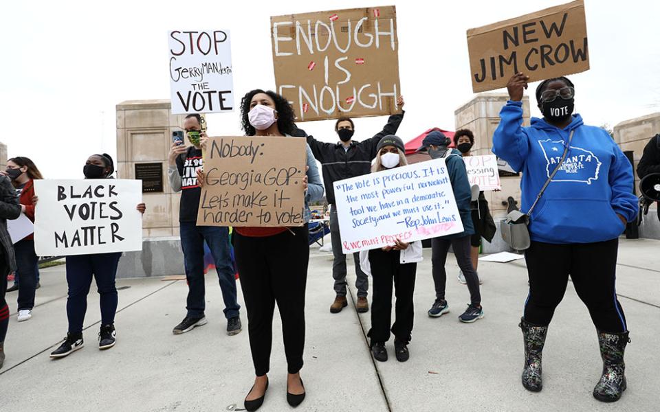Demonstrators in Atlanta gather outside the Georgia State Capitol March 1 to protest H.B. 531, passed by the Georgia House to restrict ballot drop boxes, require more I.D. for absentee voting and limit weekend early voting days passed. (CNS/Reuters)