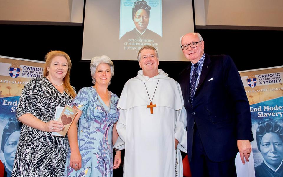Alison Rahill, left, Jenny Stanger and John Fisher of the Sydney Archdiocese's Anti-Slavery Task Force are joined by Archbishop Anthony Fisher at a seminar on ethical sourcing of products in 2020. (CNS)