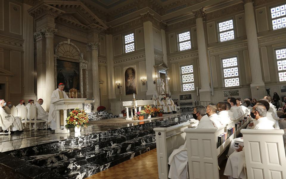 Cardinal Blase Cupich of Chicago reads a letter from Pope Francis at the beginning of Mass in the Chapel of the Immaculate Conception at Mundelein Seminary Oct. 17. (CNS/Chicago Catholic/Karen Callaway)